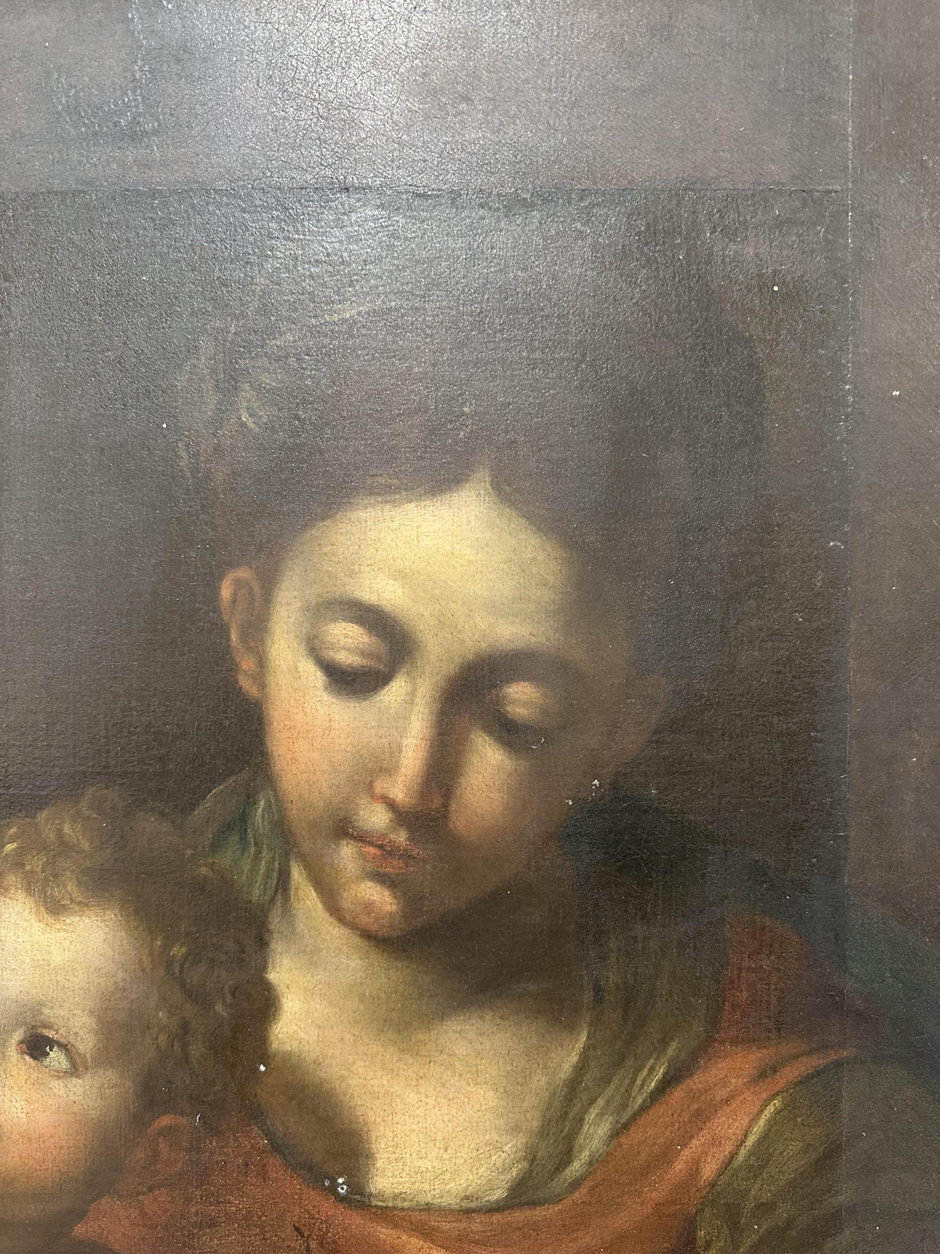 Circle of Domenico Zampieri, called il Domenichino, Italian 1581-1641, 'The Madonna and Child with the infant Saint John the Baptist and Angels'